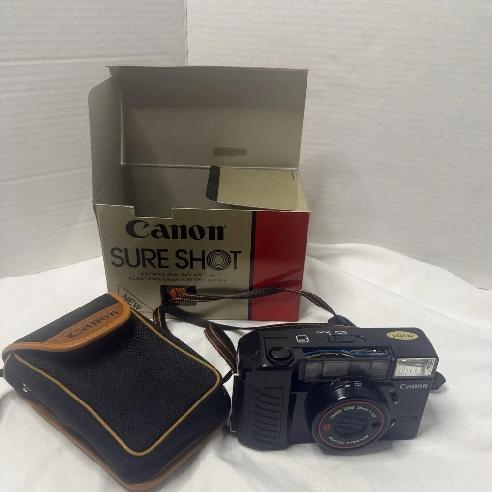 Canon Sure Shot Supreme 38mm 1:2:8 Point & Shoot Film Camera w Case Untested